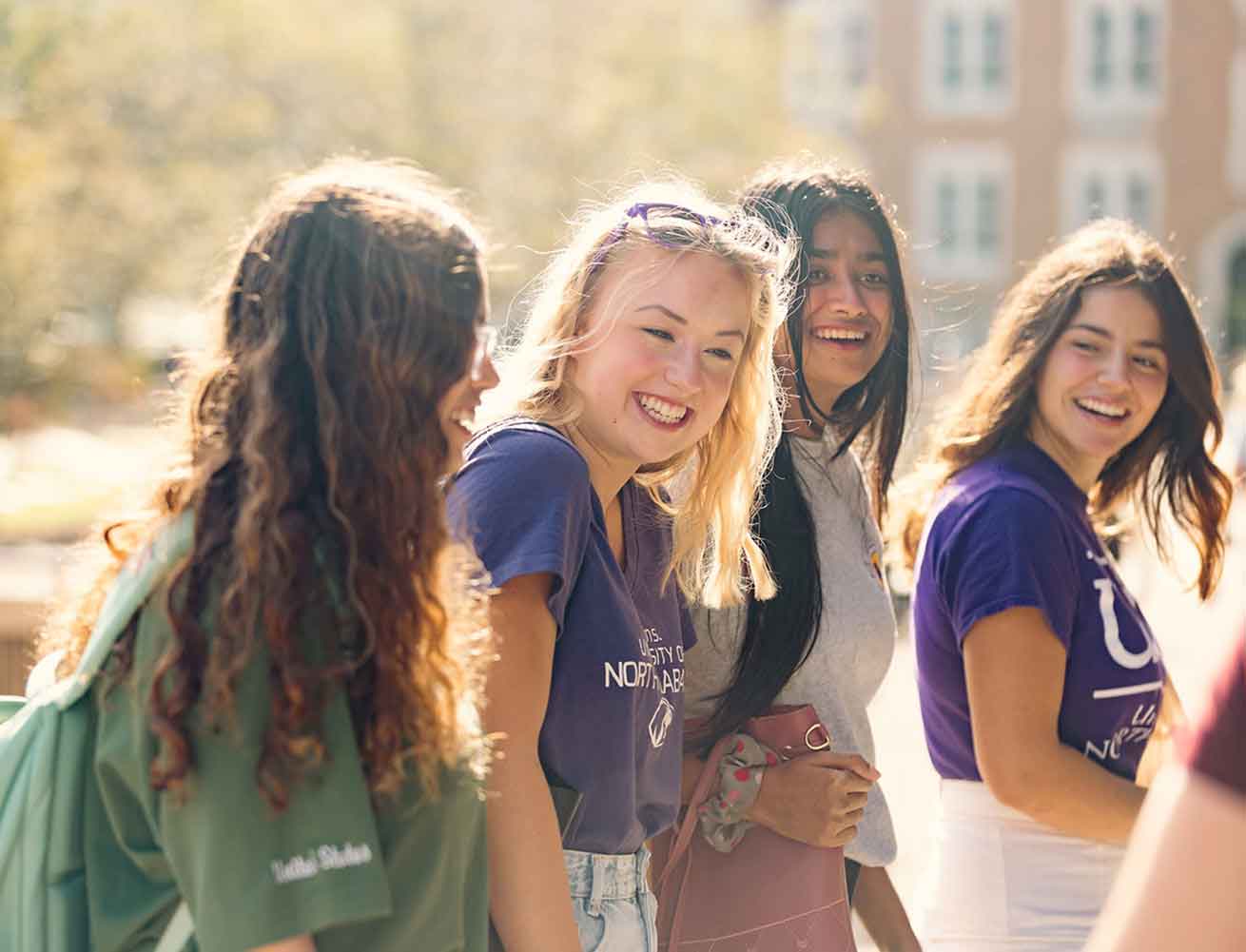 smiling young women on campus